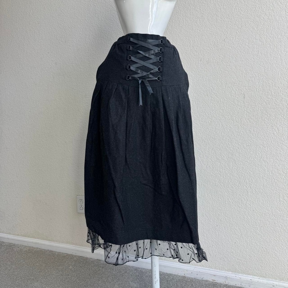 B.B. Black midi skirt with polka dot lace hem